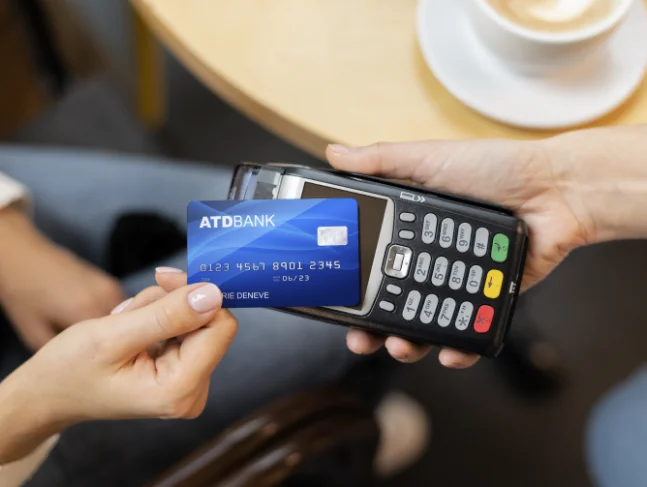 Person Paying On Retail POS Machine